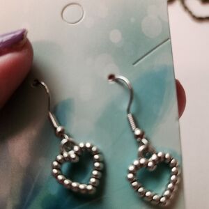 Silver tone heart earrings